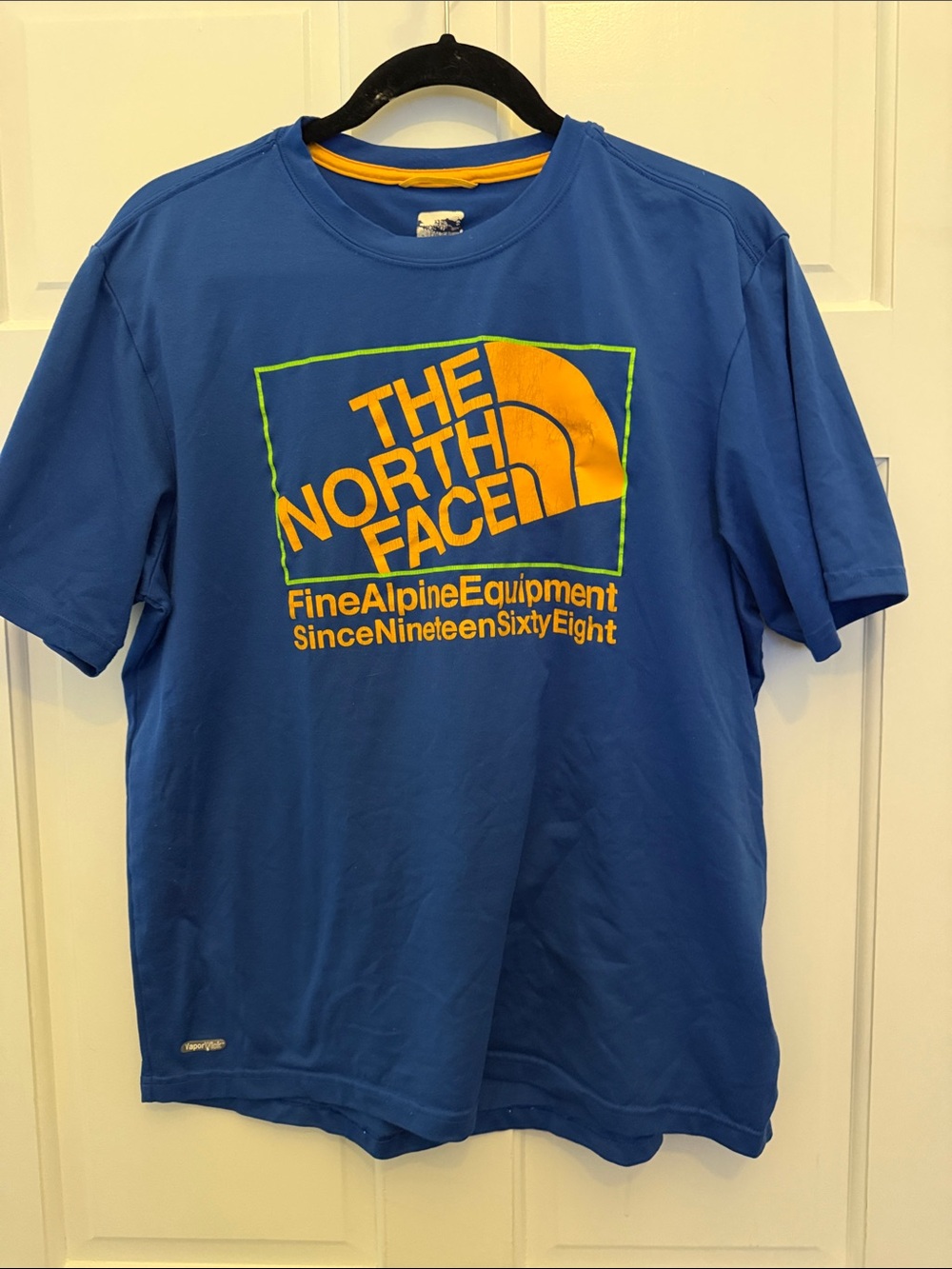 The North Face Men’s Royal Blue Short-Sleeve Logo Tee with Yellow Accents